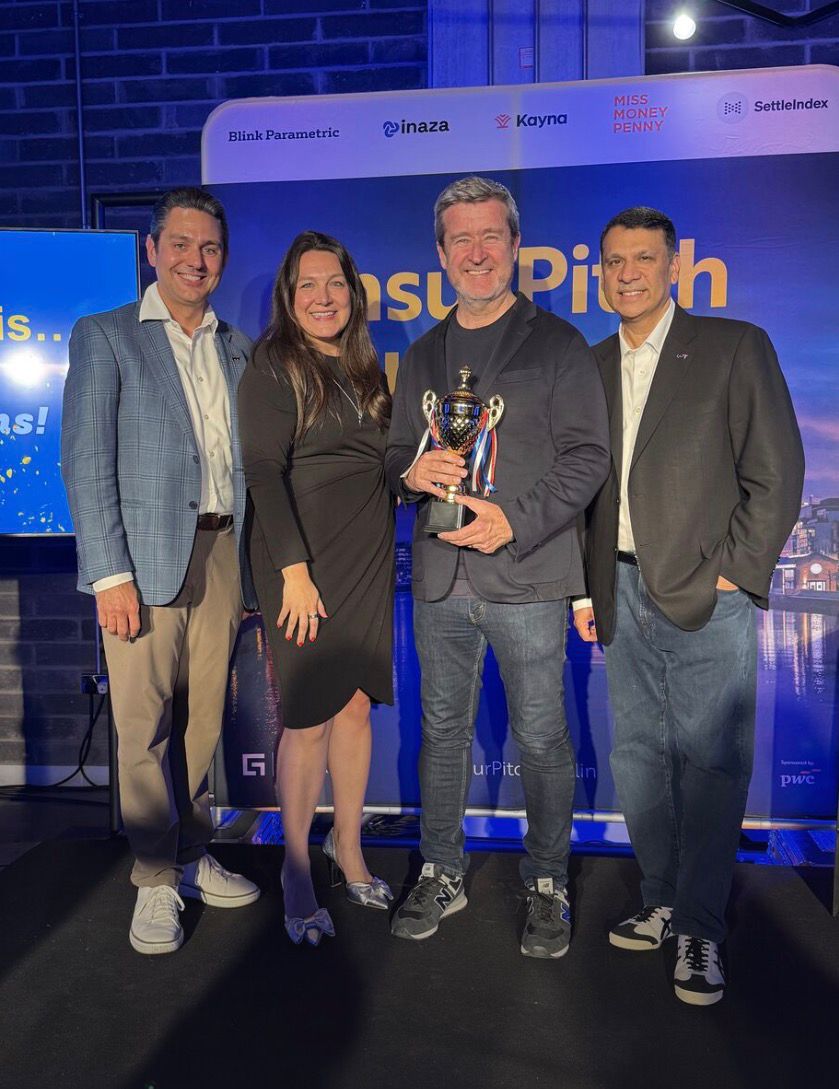 Kayna team accepting the InsurPitchDublin 2026 winner's trophy on stage